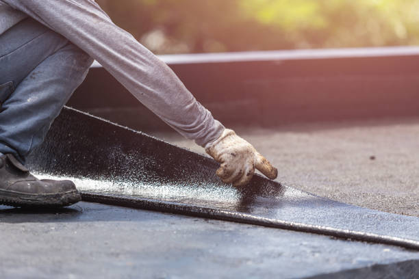 Professional Exterior Waterproofing technician working in Madison, IN